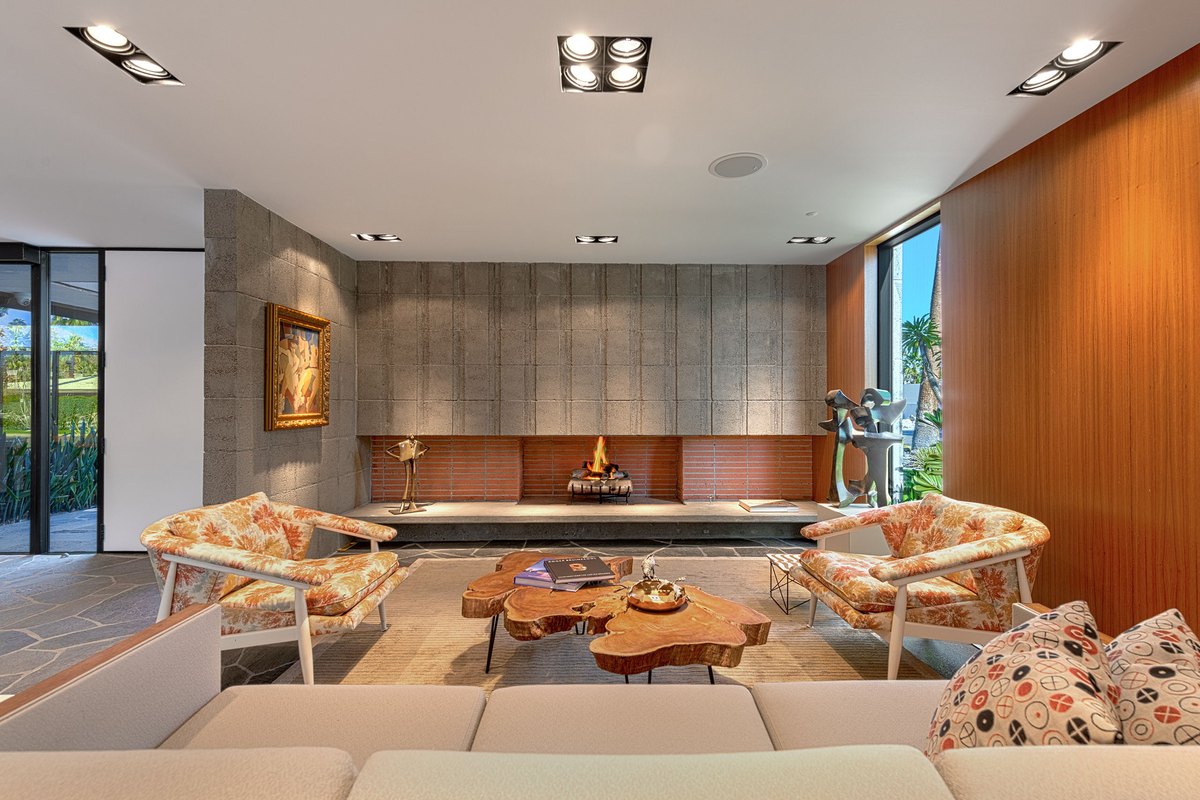 Aluminum entry gate and glass-enclosed courtyard at the Sutter Residence, Palm Springs